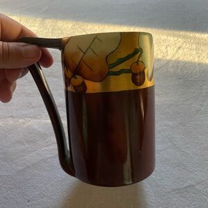 Artistic Ceramic Mug with Leaf Design by GHB co.